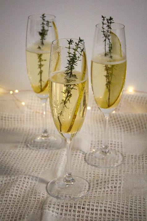 This Champagne Cocktail with homemade pear syrup is a harmonious combination of pear, thyme, and champagne. A sparkling champagne cocktail that is perfect to toast any special occasion such as birthdays, brunches or New Year’s Eve. Pear Syrup, Thyme Recipes, Sparkling Champagne, Winter Cocktails, Champagne Cocktail, Craft Night, Winter Food, Sparkling Wine, Simple Syrup