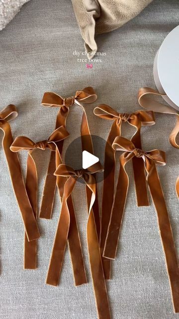 Jennifer Glufling on Instagram: "How I tied my christmas tree bows! 

Comment BOW below to receive a DM with the link to shop this post on my LTK ⬇ https://liketk.it/4WzBS 

#bowtutorial #christmastree #velvetbows #christmasideas #howtotieabow #ribbonbows" Ribbon On Stocking, Christmas Velvet Bows, Christmas Bows On Chairs, How To Attach Bows To Christmas Tree, Bows On Christmas Tree Ideas, Diy Christmas Bows For Tree, How To Tie A Flat Bow With Ribbon, Bows For Xmas Tree, Christmas Tree Bows Diy How To Make