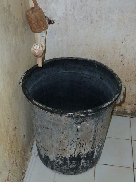 Photographed somewhere in the Visayas, Philippines, this dirty bucket is for showering. You fill up the bucket with water, and then you use a scoop to pour the water over your body. And while this method of bathing is very common, it is not as common to find the buckets this filthy-looking. Bucket With Water, Water Aesthetic, Dirty Water, English Class, Buckets, Writing Tips, Philippines, Bathrooms, Sketch