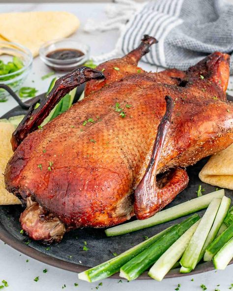 Whip up a culinary masterpiece with this easy Peking Duck recipe! Perfectly crispy and bursting with flavor. #PekingDuck #EasyChineseCooking Yearly Traditions, Peking Duck Recipe, Chinese Chicken Wings, Roasted Duck Recipes, Goose Recipes, Multi Cooker Recipes, Almond Chicken, Authentic Chinese Recipes, Peking Duck