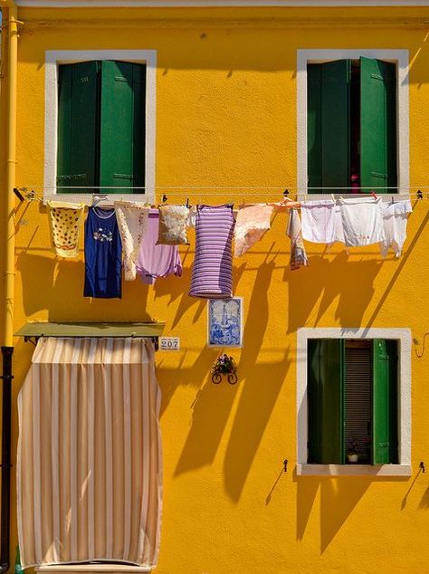 Burano Italy, Clothes Hanging, Yellow Houses, Colourful Buildings, Yellow Aesthetic, Urban Sketching, Mellow Yellow, Clothes Line, Shutters