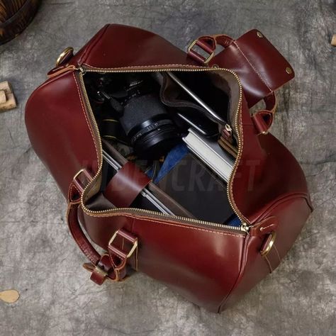 This tote features sturdy Bridle handles that soften over time, inside and outside pockets, antiqued brass rivets, and a handy key loop. Cabin Luggage, Leather Duffel Bag, Leather Duffel, Weekend Travel Bags, Travel Duffle Bag, Mens Travel, Mens Travel Bag, Leather Duffle Bag, Leather Travel Bag