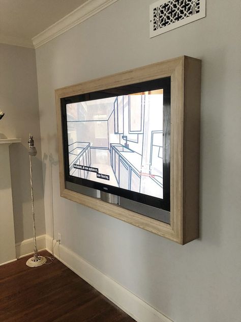 We love watching TV but I often don't love how televisions look in a room. Today I am going to share how to build an inexpensive TV art frame. Cornice Tv, Mounted Tv Ideas Living Rooms, Tv Mounted, Bedroom Tv Wall, Build A Frame, Suport Tv, Diy Dresser Makeover, Diy Accent Wall, Tv Wall Mount