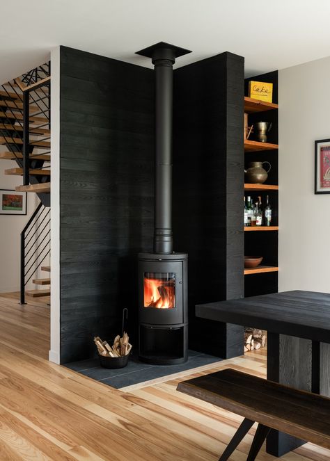 Photo 10 of 24 in Halladay House by Mary Beth Childs - Dwell Hearth Ideas For Wood Stove, Wood Storage Fireplace, Wood Burning Fireplace Ideas, Modern Wood Stove, Two Way Fireplace, Indoor Wood Burning Fireplace, Scandinavian Fireplace, Fireplace Photo, Corner Stove