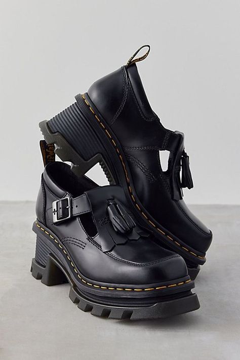 Dr. Martens Corran Mary Jane heeled shoes. Extra-stompy Mary Janes from Dr. Martens. Statement Mary Janes in luxe Atlas leather with a kiltie fringe at the buckled upper. Made with a Goodyear welt and classic Docs DNA like grooved edges and visible stitching. Finished with exaggerated lug soles. Features Dr. Martens Corran Mary Jane heeled shoes Premium Atlas leather Mary Jane Docs Exaggerated lug soles Buckle closure Content + Care Leather, rubber Spot clean Imported | Dr. Martens Corran Mary J Mary Jain Shoes, May Jane Shoes, Zappos Shoes Women, Women’s Dress Shoes, Doc Mary Janes, Doc Martens Heels, Mary Jane Boots, Mary Jane Doc Martens, Fall Shoes For Women