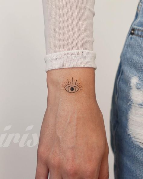 Speak Up Tattoo Ideas, Tatoos Evil Eye, Super Trouper Tattoo, Evil Eye Tattoo Leg, Dainty Evil Eye Tattoo, Evil Eye Minimalist Tattoo, Eye On Finger Tattoo, Evil Eye Sketch, Eye Tattoo Wrist