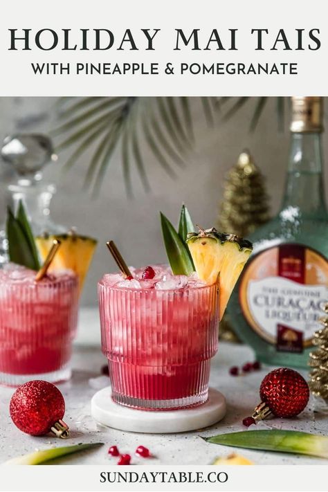 These holiday mai tais are perfect for Christmas and other winter holidays! This rum cocktail with pineapple juice, cranberry, lime, and Curacao liqueur is an easy, fun, creative, tropical drink for parties and the holidays. Use light, spiced, or dark rum depending on what you have. You can also make it in a pitcher for a crowd! Mai tais are a boozy, Hawaiian-inspired alcoholic drink but they're very drinkable and so good! If you need a Christmas drink for adults, your guests will love these. Simple Cocktails, Orange Cocktails, Christmas Drink, Tiki Cocktails, Tiki Drinks, Rum Cocktails, Festive Cocktails, Alcoholic Drink, Rum Drinks