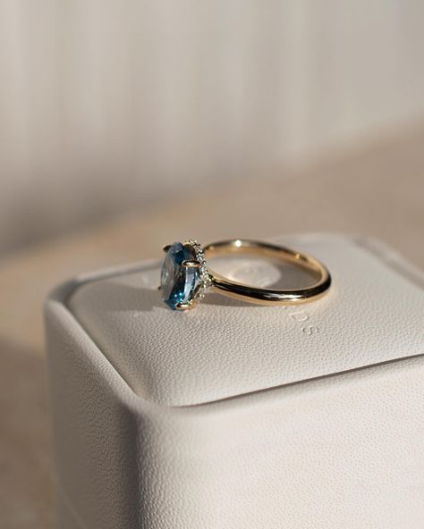 If you’re wondering what that gorgeous centre stone is, it’s a 2ct, oval blue spinel 💙 For even further flare, we have a stunning curved hidden moissanite halo Details: - 2ct oval blue spinel - 20x round moissanites - 10k yellow gold - 2.3mm wide shank #engagementringdesign #customengagementring #spinelengagementring #nz #ovalengagementring #aus #engagementringideas Spinel Engagement Ring, Spinel Engagement Rings, Blue Spinel, Custom Engagement Rings, Oval Engagement, Engagement Rings Oval, Hidden Halo, Fantasy Jewelry, Designer Engagement Rings