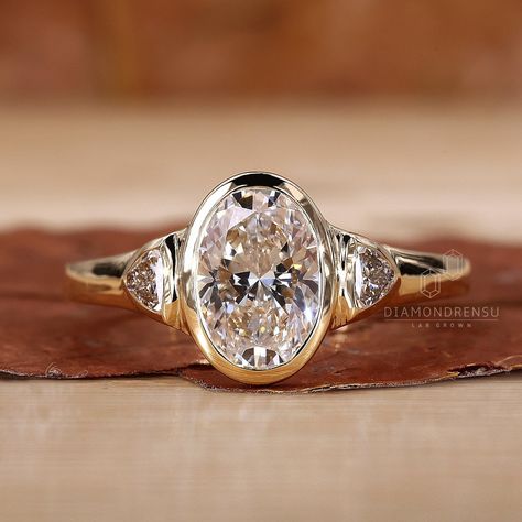 This Engagement Rings item by DiamondrensuLabgrown has 135 favorites from Etsy shoppers. Ships from India. Listed on May 28, 2024 Types Of Stone Settings, Vintage Band Engagement Ring, Oval Diamond Ring With Side Stones, Inset Diamond Ring, 3 Stone Bezel Set Ring, Three Stone Bezel Set Ring, Oval Bezel Set Engagement Ring, Oval Bezel Engagement Ring, Oval Diamond Rings