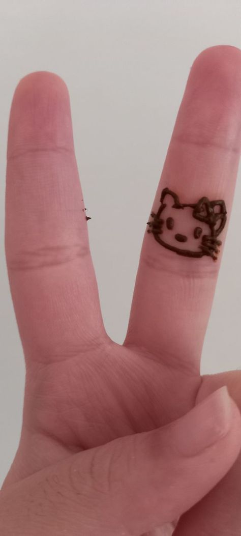 Hello Kitty Henna- by Shreya Kawaii Henna Designs, Henna Designs Hello Kitty, Hello Kitty Henna Design, Henna Hello Kitty, Hello Kitty Henna, Coquette Henna, Minimalistic Henna, Dainty Henna, Minimalist Henna