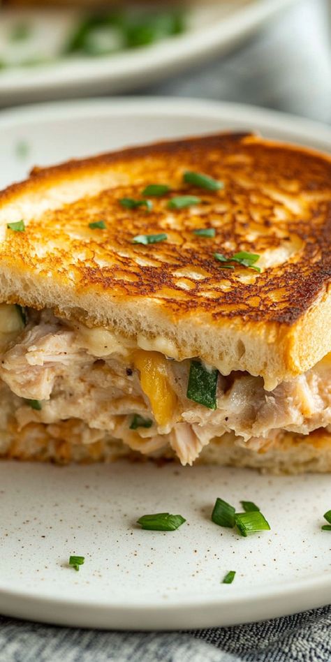 Bake the perfect tuna melt in the oven! Crispy bread and gooey cheese make this sandwich a family favorite. Tuna Melt In Oven, Tuna Melt Recipe Oven, Oven Tuna Melt, Tuna Melt Sandwich In Oven, Open Face Tuna Melts In The Oven, Tuna Melts Recipe, Tuna Melts In The Oven, Tuna Melt Sandwich, Tuna Melt Recipe