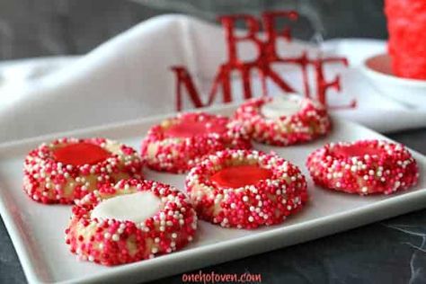 Valentine's Day Thumbprint Cookies | One Hot Oven Easy Valentines Day Cookies, Thumbprint Cookies With Icing, Cookies With Icing, White Cookies, Easy Valentines, Pink Icing, Valentines Day Cookies, Thumbprint Cookies, I Wish I Knew