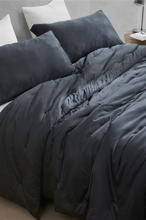 Made of 155 GSM of 100% Nylon on both sides, the silky hand feel has naturally cooler properties compared to other materials. Infused with a Down Alternative filling that isn't too thick, our Cool as the Other Side of the Pillow Coma Inducer® is one of the best comforters if heat is your enemy. We'll go so far as to say if you don't think our Cool as the Other Side of the Pillow Coma Inducer® is cold or cooling enough then your best bet is to forget all comforters and sleep with no covers. Best Comforters, Luxury Comforter Sets, Oversized Comforter, Grey Comforter Sets, Cool Comforters, The Pillow, Black King, Bedding Stores, Queen Comforter