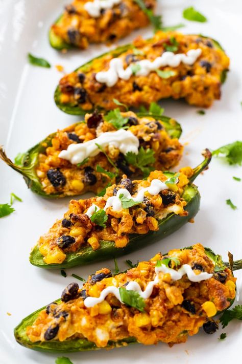 Black Bean and Corn Stuffed Jalapenos #vegetarian Vegetarian Jalapeno Poppers, Jalapeno Recipe, Jalapeno Appetizer, Vegetarian Appetizers Easy, Stuffed Jalapenos, Spicy Southern Kitchen, Vegetarian Appetizer, Vegetarian Stuffed Peppers, Black Bean And Corn