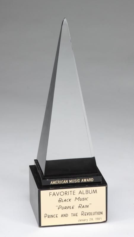 PRINCE AMERICAN MUSIC AWARDS STATUE FOR PURPLE RAIN - Current price: $4000 Symbol Of Music, Crystal Trophy, Famous Lifestyle, Prince And The Revolution, Hollywood Music, Career Vision Board, Music Appreciation, Trophy Design, Dream Music