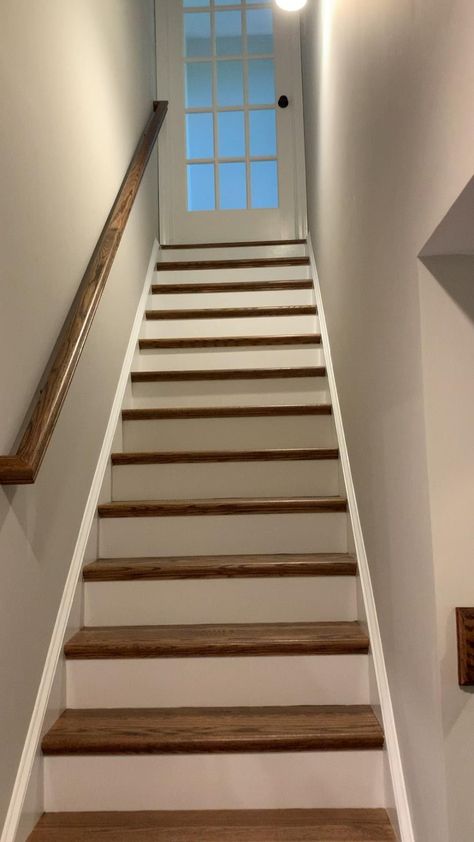 Wood Stairs Renovation, Laminate Wood Flooring Stairs, Stair Tiles Ideas, Lvp Stairs, Stair Case Ideas, Basement Steps Ideas, Tiles For Stairs, Stairs Makeover Design, Door Iron