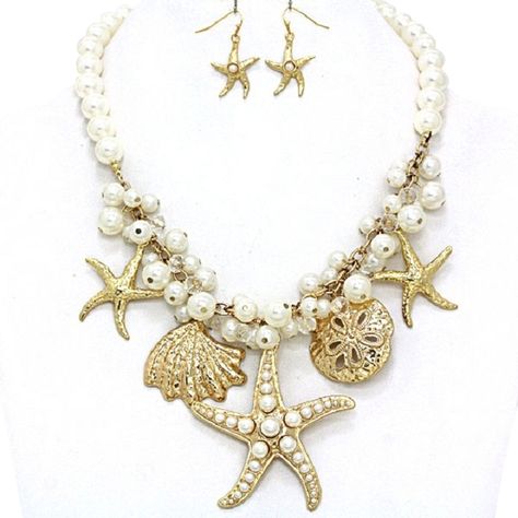 Seaworld Sealife Charm Starfish Seashell Sand Dollar Gold Tone Pearl Necklace And Earring. Get the lowest price on Seaworld Sealife Charm Starfish Seashell Sand Dollar Gold Tone Pearl Necklace And Earring and other fabulous designer clothing and accessories! Shop Tradesy now Seashell Jewellery, Altered Art Jewelry, Starfish Jewelry, Denim Earrings, Gold Chain Earrings, Resin Accessories, Sea Jewelry, Beauty Spot, Bib Collar