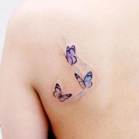 Small Butterfly Tattoo Color, Lavender Butterfly Tattoo, Butterflies Back Tattoo, Butterflies Tattoos, Watercolor Butterfly Tattoo, Butterfly Tattoos Images, Wrist Tattoo Ideas, Lavender Tattoo, Henna Tattoo Hand