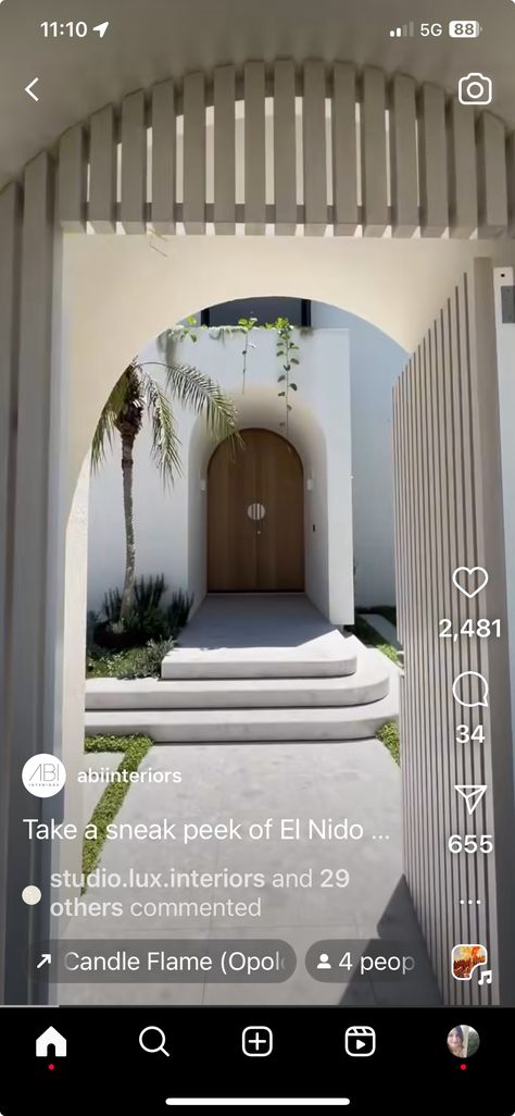 Front Gates & Fence & Letterbox ￼ ￼ ￼ ￼  ￼ ￼ ￼ ￼ ￼ ￼ ￼ ￼ Landscape Designer on Instagram Landscape Designer on Instagram: "NSW  Clients wanted a Coastal/native/resort feel exterior design keeping in mind that they are surrounded by bushland. The house is very white and they wanted to add some warmth by giving it that raw touch.   We chose stone cladding from @artisanexterior.au at the entrance which will add warmth and texture along with deco battens from @deco_australia for the entrance gate. Brass house number from us @raw_exteriordesigns. Large boulders and native planting for low maintenance and to create a grand entrance.   Take a look at the reel to see more of this amazing design featuring full exterior design and landscaping, basketball court, firepit area and much more.  Prices st Coastal Gate Entrance, Gate Entrance, Entrance Gate, Instagram Landscape, Landscape Designer, Fire Pit Area, Front Gates, Stone Cladding, Entrance Gates