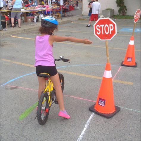 A child learning about cycling safety at Rainbow Routes Association's first Bike Safety Rodeo. Bike Rodeo Ideas For Kids, Bike Obstacle Course, Obstical Course For Kids, Bike Safety Activities, Bike Rodeo, Bicycle Birthday Parties, Rock And Roll Birthday Party, Bike Parade, Bike Party