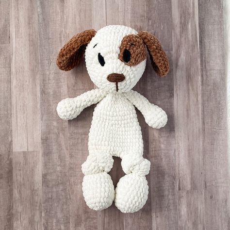 This is a free crochet snuggler pattern of the cuddly classic puppy! Half stuffed animal, half blanket but twice the fun! This crochet dog lovey would be a great crocheted nursery gift! Embroidered eyes and blanket yarn make it more baby friendly. Best Crochet Projects To Sell, The Friendly Red Fox Crochet Patterns, Crochet Dog Lovey Pattern, Amigurumi Lovey Free Pattern, Crochet Patterns With Chunky Yarn, Free Crochet Snuggler Pattern, Crochet Stuffy Free Pattern, Free Lovey Crochet Pattern, Crochet Baby Snuggler