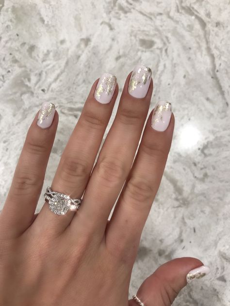 Gold foil nails #nails #naildesign #engagementring #style #nailart #whitenails White And Silver Foil Nails, White With Foil Nails, Biab Nails Gold Foil, Winter Foil Nails, White Silver And Gold Nails, Nails With Foil Flakes Silver, White Gold Foil Nails, White And Gold Foil Nails, White And Gold Flake Nails