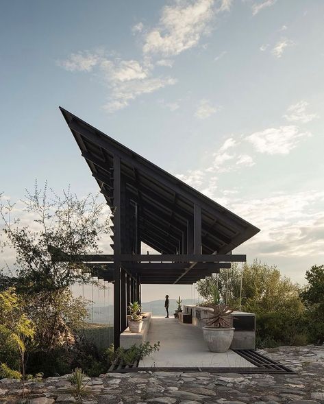 Espina Pavilion, perched atop a hill in Santiago de Querétaro! Designed by @santiagomart10 & @a.em.studio in collaboration with @matorral__, this architectural marvel harmonizes form and function with its lightweight roof and striking cantilever. The pavilion’s seamless blend with nature, earthy gabion masses, and rustically elegant tension cables make it a true work of art. 📷: @cesarbelio Dive into the full story behind this architectural gem—link in bio! #EspinaPavilion #Architecture ... Cantilever Structure, Timber Pergola, Get Published, Timber Architecture, Cattle Ranch, Pavilion Architecture, Pavilion Design, Pergola Attached To House, Innovative Architecture