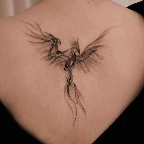 Back And Rib Tattoo Women, Protector Tattoo Women, Twisted Tattoo Ideas, Phoenix Tattoo On Back, Smoky Phoenix Tattoo, Model Tattoos Woman, Fenix Tattoo Woman Arm, Black Phoenix Tattoo Women, Phoenix Tattoo Chest