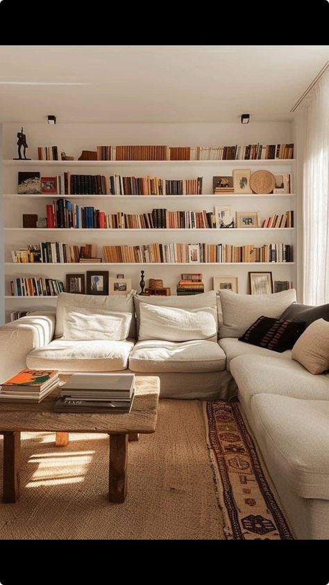 Library Wall Shelves, Living Room Designs Library, Shelving Unit Behind Couch, Floating Bookshelf Living Room, Wall Library Ideas, Bookshelf Above Couch, Utrecht Apartment, Bookshelves Behind Couch, Living Room With Bookcase