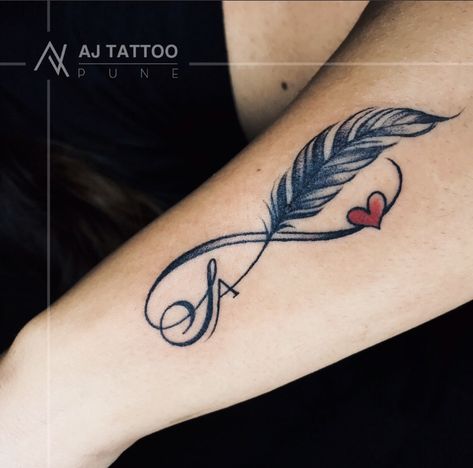 Infinity Tattoos Done By @ajtattoopune Follow @ajtattoopune for more ! - "WALK in for FREE Consultation" To Book an Appointment DM or Call 📞 7709537129 / 9665954007 @ajtattoopune • Fastest Growing Tattoo Studio in Pune • Trusted by 7000+ Clients • Walk in for Free Consultation! Contact Us for Any Queries! #infinity #infinitytattoo #infinitytattoos #infinitytattoodesigns #infinitysymbol #tattooforgirls #besttattooartistinpune #ajtattoo #ajtattoostudio #ajtattoopune #punetattoo #dang Feather Tattoo With Infinity, Feather And Infinity Tattoo, Infinity Feather Tattoos, Feather Infinity Tattoo Design, Infinite Tattoos For Women, Infinity Feather Tattoo Design, Infinity Tattoos For Women, Infinity Feather Tattoo, Infinity Tattoo For Men