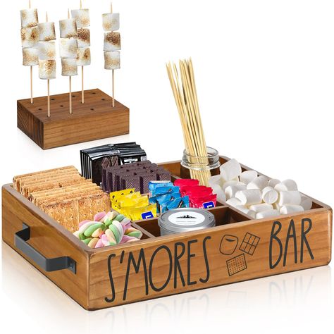 PRICES MAY VARY. MULTIFUNCTION DESIGN WITH 5 COMPAREMENT: The storage space of the s'mores container is 14"Lx10.9"Wx2.7"H, which is ideal for things portion and provides you with enough place to hold different kinds of items, such as snacks, s'mores, donuts, bar fixings, cookies, chocolates, small plants, etc., offering you diverse choices. FARMHOUSE S'MORES STATION DECOR BOX: The smores caddy is made of solid pine wood material, with smooth surfaces which is sturdy and serviceable, which is saf Bbq Smores, Smores Basket, Smores Caddy, Smores Maker, Smores Party, Smores Kits, Organizer For Kitchen, Wood Block Crafts, Camping Bbq