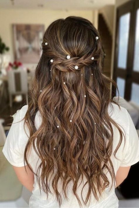 I can’t resist sharing more examples of half up half down hairstyles with added embellishments because they are truly stunning. After the bow, there are pearls.

I leave it completely up to you to decide how many pearls it will be.//photocredit:@beautifullyredeemedd Half Up Half Down Curls With Braid, Half Up Half Down Hairstyles Graduation, Wedding Hairstyles With Pearls Down, Half And Half Bridal Hair, Bridal Hair Half Up Pearls, Curled Hair With Pearls In It, Half Up Half Down Wedding Hair For Bridesmaid, Wedding Hair Half Up Half Down With Hairpiece, Half Back Hairstyles Wedding