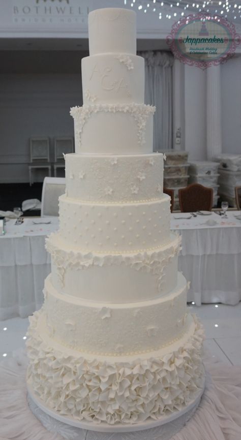 8 tier, all white wedding cake with hand piped detailing and ruffles. 6 Tier Wedding Cakes, All White Wedding Cake, Bolo Musical, Fake Wedding Cakes, 5 Tier Wedding Cakes, Winter Wonderland Wedding Theme, Southern Wedding Cakes, Tall Wedding Cakes, Extravagant Wedding Cakes