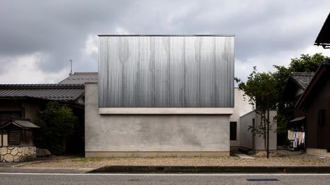 Sheets of corrugated steel envelop the upper storey of this house and studio for a photographer, which was designed by local architect Kouichi Kimura Houses In Japan, Camp House, Japan Architecture, Compact House, Prefabricated Houses, Shiga, Steel House, Japanese Architecture, Architect House