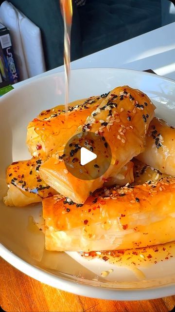 Easy Home Meals on Instagram: "These Baked Feta Parcels with Warm Honey are perfectly sweet and salty! Wrapped in golden, crispy Phyllo Dough and slathered with high-quality butter, these parcels deliver the perfect crunch. 

For the full recipe, visit the link in our bio!

Made by cookingwithlamees using @athens_foods and @landolakesktchn

#AD #RealFoodFrozen #DairyAndBeyond #feta #bakedfeta" Phyllo Dough Recipes Dinner, Feta Parcels, Easy Home Meals, Phyllo Dough Recipes, Athens Food, Baked Feta, Home Meals, Phyllo Dough, Dough Recipe