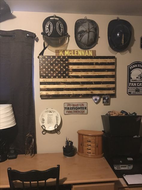 My old firefighter helmets, wooden flag, and firemen's prayer plate above the desk 🔥🚒 Firefighter Room Decor, Firefighter Helmet Display, Firefighter Memorabilia Display, Firefighter Decor House, Firefighter Bedroom, Fireman Decor, Fire And Ems Wood Flag, Firefighter Room, Fireman's Prayer