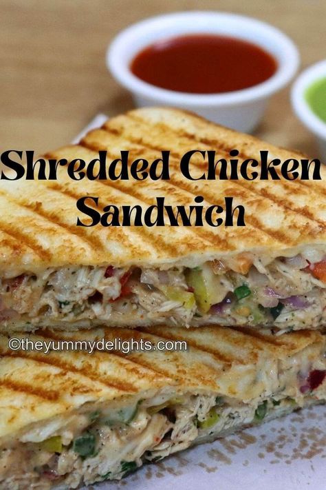 close-up of shredded chicken sandwich stacked on a board. Chicken Sandwich Filling, Chicken Mayonnaise, Shredded Chicken Sandwiches, Grilled Sandwich Recipe, Chicken Breast Sandwich, Easy Breakfast Sandwich, Chicken Sandwich Recipe, Healthy Sandwich Recipes, Breakfast Sandwich Recipes