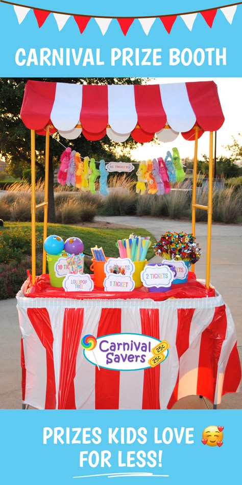 Colorful carnival prizes displayed with red and white awning and tablecloth outside on a beautiful day! Diy Carnival Prizes, Carnival Prizes Ideas, Prizes For Adults, Prizes For Kids, Carnival Day, Carnival Activities, Puzzle Rings, Bouncing Balls, Prize Ideas