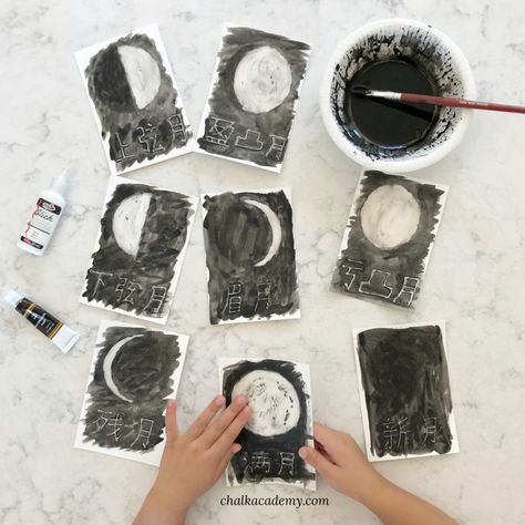 Moon Phases Glue Resist Watercolor Painting is a fun, hands-on way to learn about the moon phases and their names! Preschool | Elementary school | STEAM | STEM for kids | Science activity | Solar system | Earth & Planets Resist Watercolor Painting, Moon Activities For Kids, Moon Phases Activities, Painting Learning, Resist Painting, Moon Activities, Space Activities For Kids, Moon Phases Art, Moon Crafts