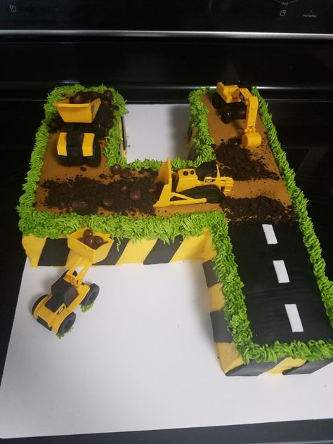 Number 4 cake construction trucks buttercream and fondant Digger Birthday Cake, Number 4 Cake, Construction Birthday Party Food, Birthday Cale, Farm Birthday Cakes, Construction Birthday Cake, Toddler Birthday Cakes, Cake Designs For Boy, Truck Birthday Cakes