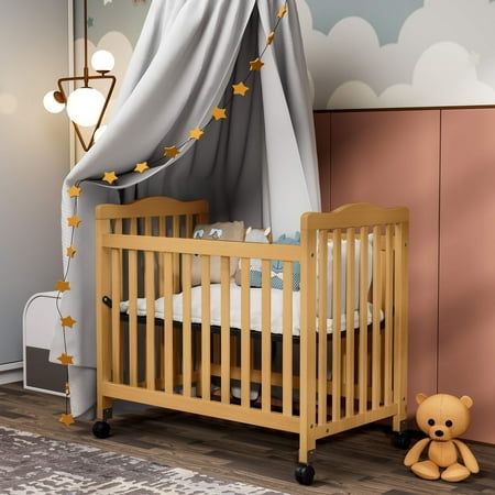 Looking for small cribs for small spaces? Our mini crib is what you need. This baby bed offers the perfect blend of style, safety, and craftsmanship in a scaled-down size. Whether you have a smaller nursery or in need of a spare travel crib for visits to grandma and grandpa's house, this mini crib serves as a versatile and compact sleep solution for your little one. With the same design and safety features as its full-size counterparts, our baby cribs are expertly crafted for ease of assembly. T Cribs For Small Spaces, Foldable Crib, Portable Baby Cribs, Small Crib, Baby Cribs Convertible, Small Nurseries, Portable Crib, Travel Crib, Cozy Living Spaces