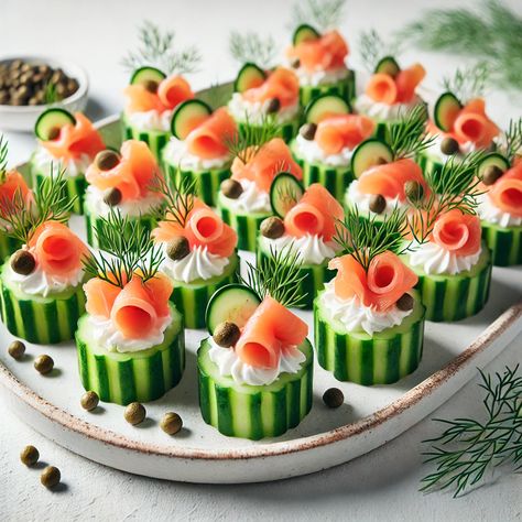 Cucumber Salmon Bites are a light and refreshing appetizer, perfect for entertaining or a healthy snack. These bite-sized treats feature crisp cucumber slices topped with smoked salmon, cream cheese, and fresh herbs like dill. The combination of the cool, crunchy cucumber and the rich, savory salmon makes for a delicious and elegant dish that's easy to prepare and full of flavor. Ideal for parties or a quick snack, these bites are both nutritious and satisfying. Cucumber Salmon Bites, Salmon Cucumber Bites, Cucumber Salmon, Tuna Bites, Smoked Salmon Cucumber, Savory Salmon, Salmon Cucumber, Smoked Salmon Cream Cheese, Salmon Cream Cheese