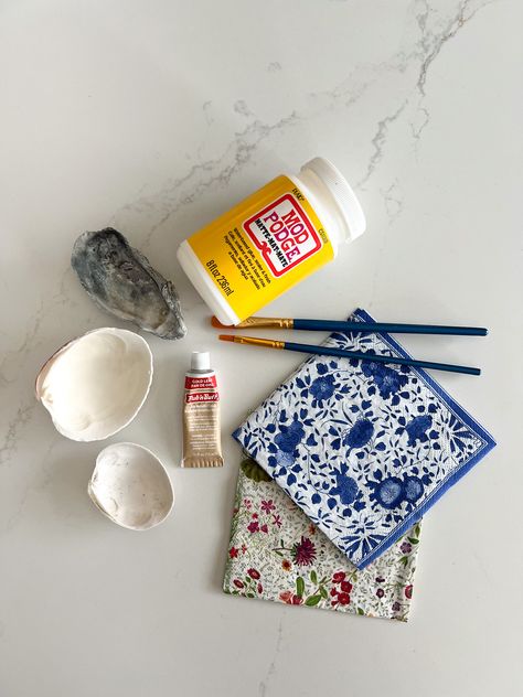 How to decoupage seashells using mod podge to create a vacation keepsake Napkin Decoupage Shells, Seashell Modge Podge, Decoupage Seashells Diy, How To Decoupage Shells, Modge Podge Shells, How To Decoupage Oyster Shells, Decoupage Shells Diy, How To Decoupage, Decoupage Oyster Shells Diy