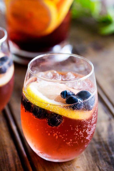 This Lemon and Blueberry Punch, is fruity and refreshing, but it delivers a great kick. Perfect for relaxing with friends, or for serving at a larger party! Easy Party Punch Recipes, Kentucky Derby Food Ideas, Derby Food Ideas, Blueberry Punch, Best Party Punch, Raspberry Sherbet Punch, Strawberry Lemonade Punch, Derby Food, Kentucky Derby Food