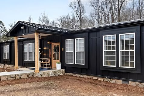 Black Mobile Homes Exterior, Black Mobile Home, Black With Wood Accents, Black Mobile Home Exterior, Painting Mobile Home Exterior, Mobile Home Upgrades, Mobile Home Siding, Black Siding, Mobile Home Repair