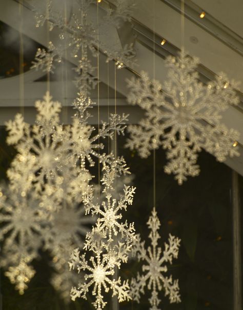 snowflakes Ceiling Snowflake Decorations, Snowflakes From Ceiling, Snowflakes Hanging From Ceiling, Hanging Snowflakes From Ceiling, Snow Hanging From Ceiling, Snowflake Ceiling, Snowflake Stage Design, Christmas Room Decor Ideas, Snowflake Installation