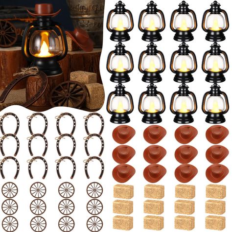 PRICES MAY VARY. Complete Western Themed Party Decorations Set: this collection consists of 120 combined sets of western cowboy theme party decorations; The package offers 24 mini lanterns, 24 mini cowboy hats, 24 mini horseshoes, 24 wagon wheels and 24 hay bales; This inclusive package will meet all your decorative needs, allowing for extra items to be stored for future use Delicate Western Cowboy Theme: our western theme centerpieces are suitable for those with a love for the west and cowboy c Western Quinceanera Ideas Centerpieces Table Decorations, Western Themed Decorations, Fall Western Wedding Table Decor, Western Themed Decor, 40th Western Birthday Party, Rodeo Table Decorations, Western Theme Party Centerpieces, Rodeo Theme Party Decor, Saloon Party Decorations