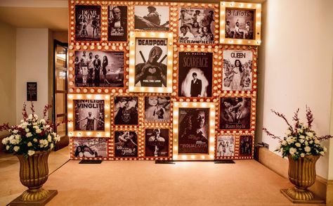 Movie Themed Photo Booth, Movie Night Photo Booth Ideas, Retro Theme Sangeet Decor, Movie Themed Event, Retro Event Design, Retro Bollywood Decor, Bollywood Theme Photo Booth, Retro Photobooth Ideas, Movie Themed Decor