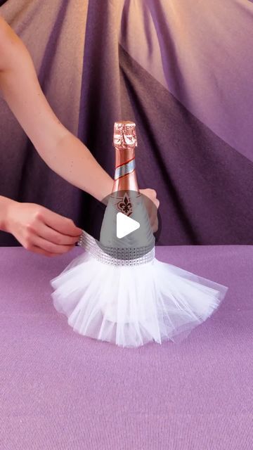 5-Minute Crafts on Instagram: "Prepare your champagne bottle for the big day 🎊  #5minutecrafts #weddingday #weddingparty #weddingdecor #bottledecor" Wine Bottle Bride And Groom, Budlight Beer Gift Ideas, Bride And Groom Bottles, Decorating Wine Bottles For Gifts, How To Decorate Wine Bottles, Wine Bottle Centerpieces For Wedding Diy, Champagne Decorations Bottle, Wedding Bottle Decorations, Modge Podge Champagne Bottle