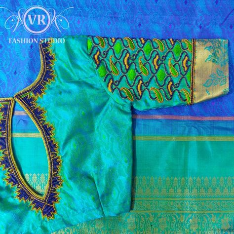 Green embroidery blouse with tube beads, sugar beads and zari threads Blue Blouse Designs, Work Blouse Designs, Maggam Work Blouse, Blouse Designs Catalogue, Traditional Blouse Designs, Wedding Saree Blouse Designs, Blouse Design Images, Cutwork Blouse Designs, Wedding Blouse Designs